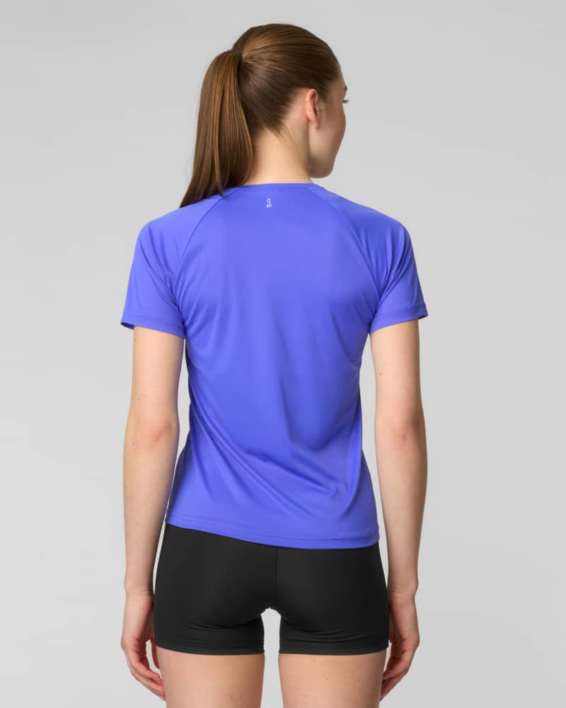 Back view of a woman wearing a periwinkle blue short-sleeve running t-shirt