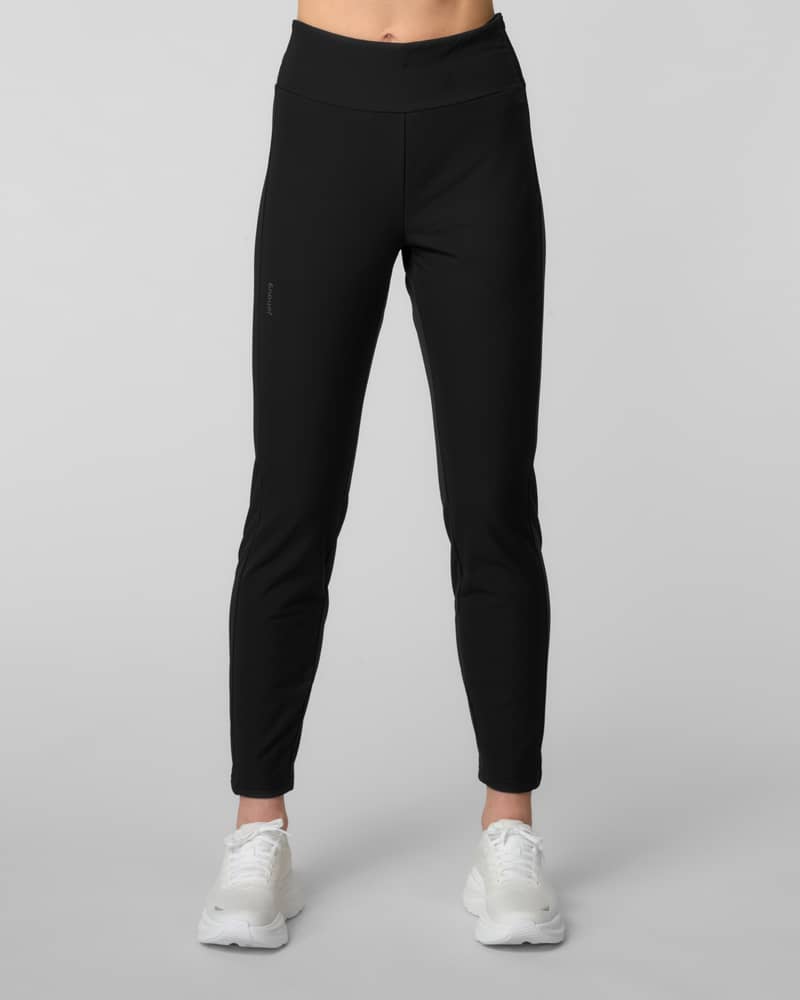 Front view of black high-waisted slim-fit running tights with a thigh logo