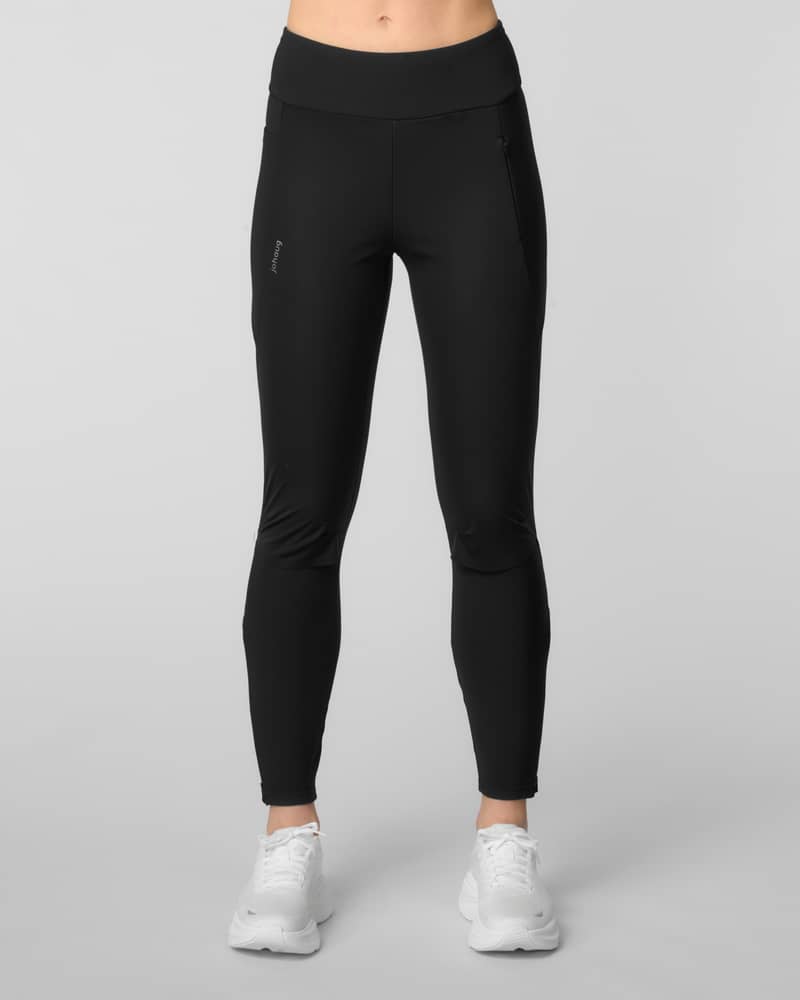 Front view of black running leggings with a side hip pocket